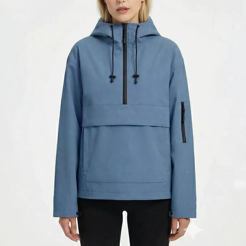 Women’s waterproof rain hoodie jacket by Bandalini, windproof rain jacket for women with hood and durable waterproof fabric.