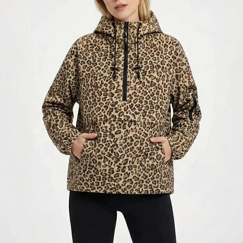 Women’s Bandalini waterproof rain hoodie jacket, windproof, shown in bright yellow with hood and front zipper detail.